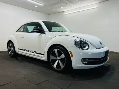 2012 Volkswagen Beetle for sale at Champagne Motor Car Company in Willimantic CT
