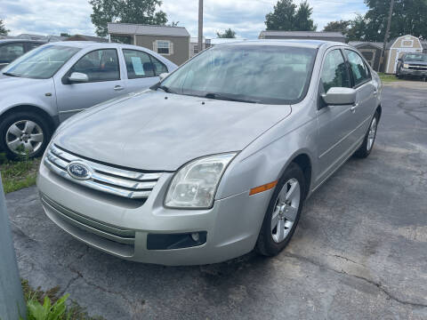 2007 Ford Fusion for sale at HEDGES USED CARS in Carleton MI