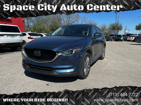 2021 Mazda CX-5 for sale at Space City Auto Center in Houston TX