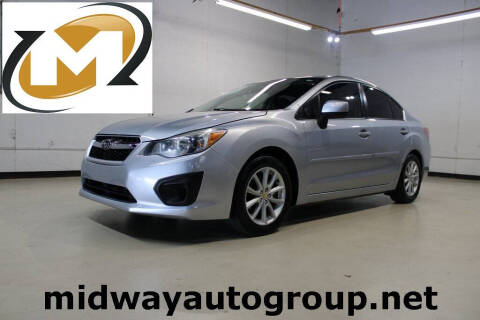 2013 Subaru Impreza for sale at Midway Auto Group in Addison TX