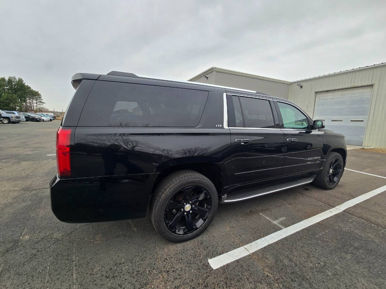 2016 Chevrolet Suburban for sale at Dedicated Auto Sales Inc in Elk River, MN