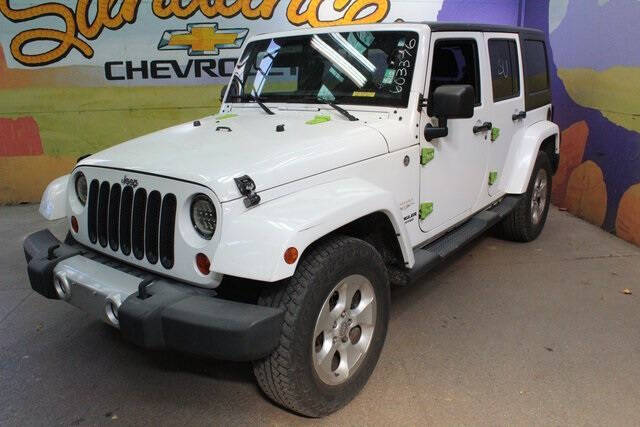 Used 2013 Jeep Wrangler Unlimited Sahara with VIN 1C4BJWEG8DL603376 for sale in Grand Ledge, MI