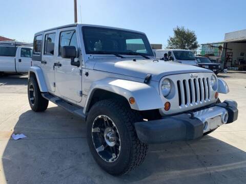 2012 Jeep Wrangler Unlimited for sale at Best Buy Quality Cars in Bellflower CA