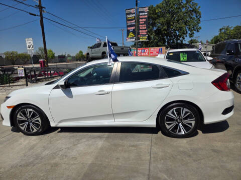 2016 Honda Civic for sale at E and M Auto Sales in Bloomington CA