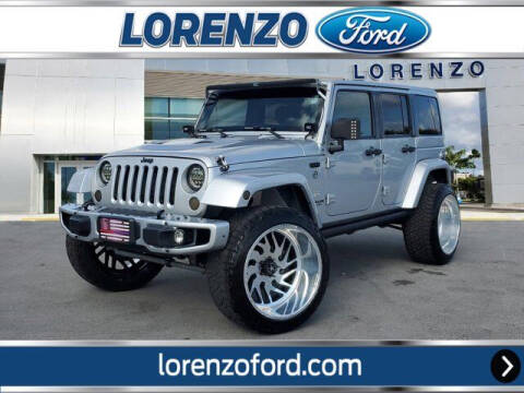 2012 Jeep Wrangler Unlimited for sale at Lorenzo Ford in Homestead FL