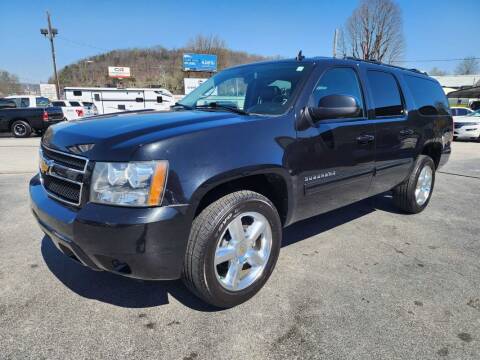 2012 Chevrolet Suburban for sale at MCMANUS AUTO SALES in Knoxville TN