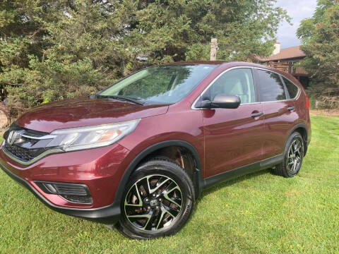 2016 Honda CR-V for sale at K2 Autos in Holland MI
