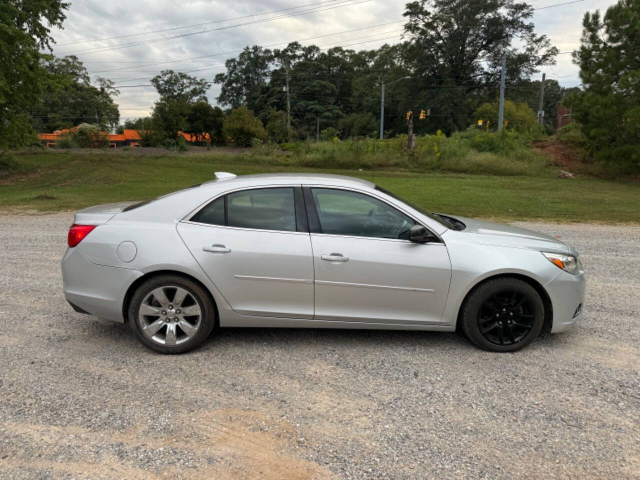 2015 Chevrolet Malibu for sale at Guadalupe Auto Sales, LLC. in Jemison, AL