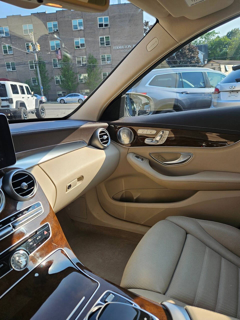 2015 Mercedes-Benz C-Class for sale at RENOS AUTO SALES LLC in Waterbury, CT