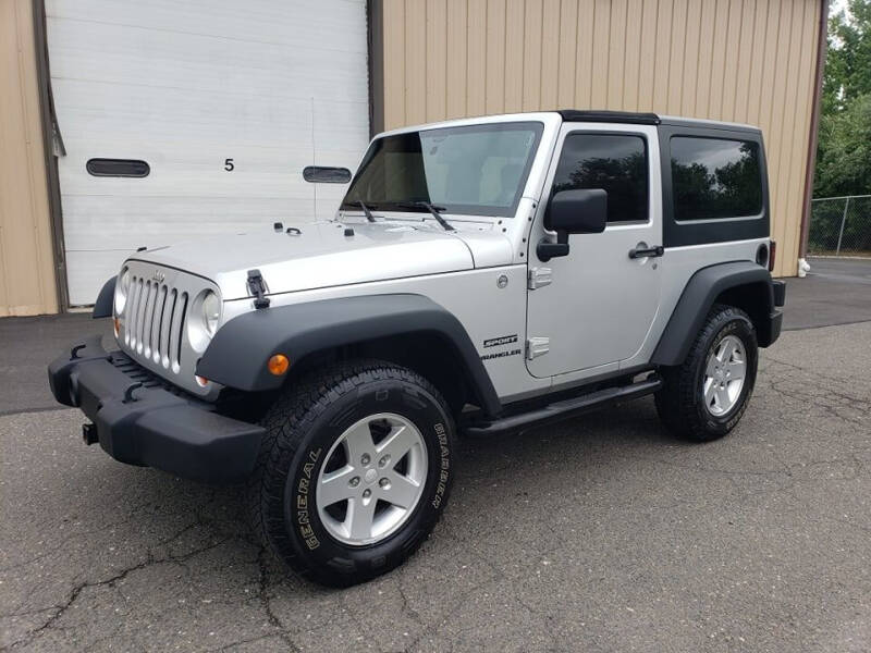 2011 Jeep Wrangler for sale at Massirio Enterprises in Middletown CT