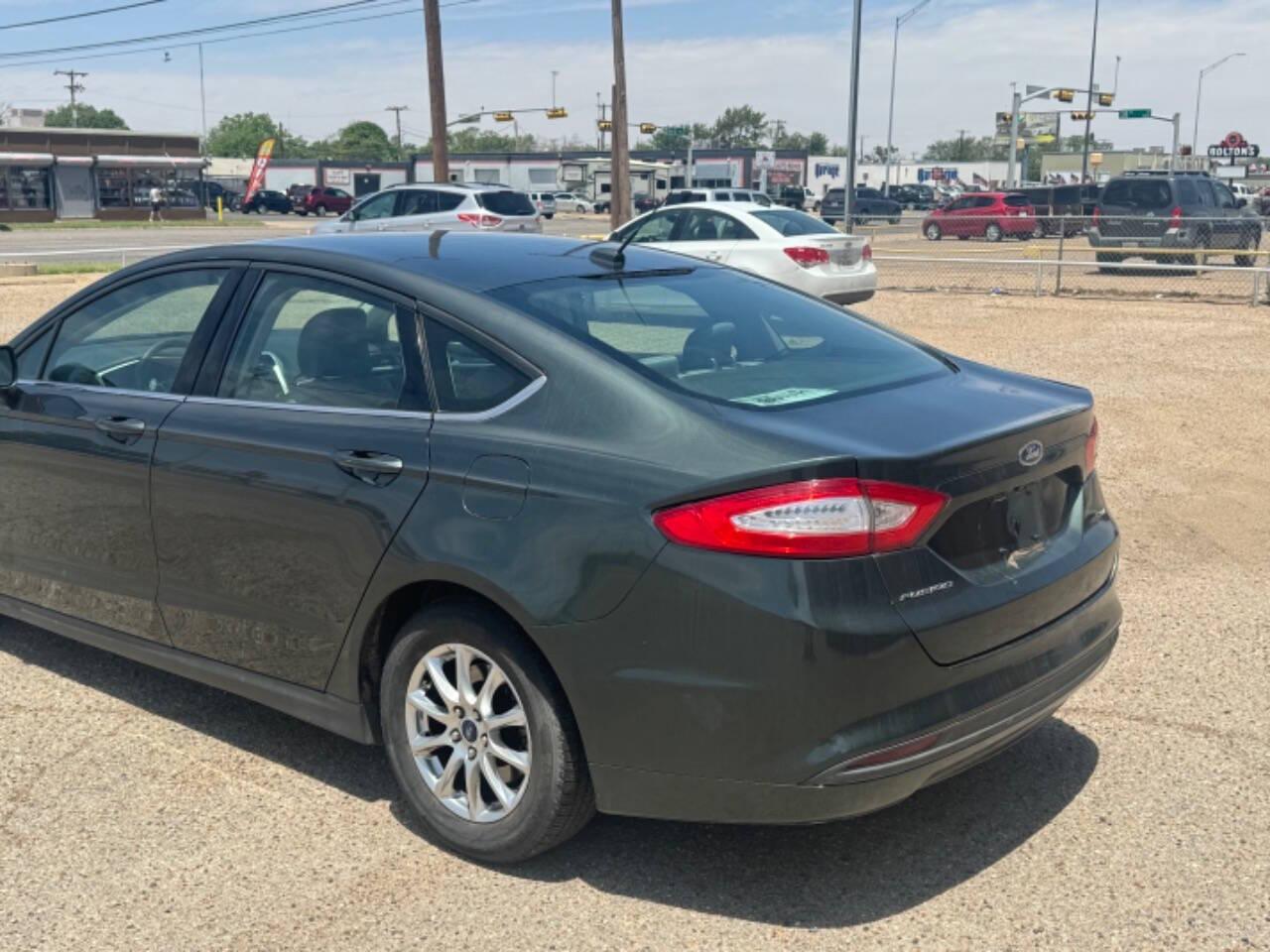 2015 Ford Fusion for sale at LEAF AUTO SALE LLC in Lubbock, TX