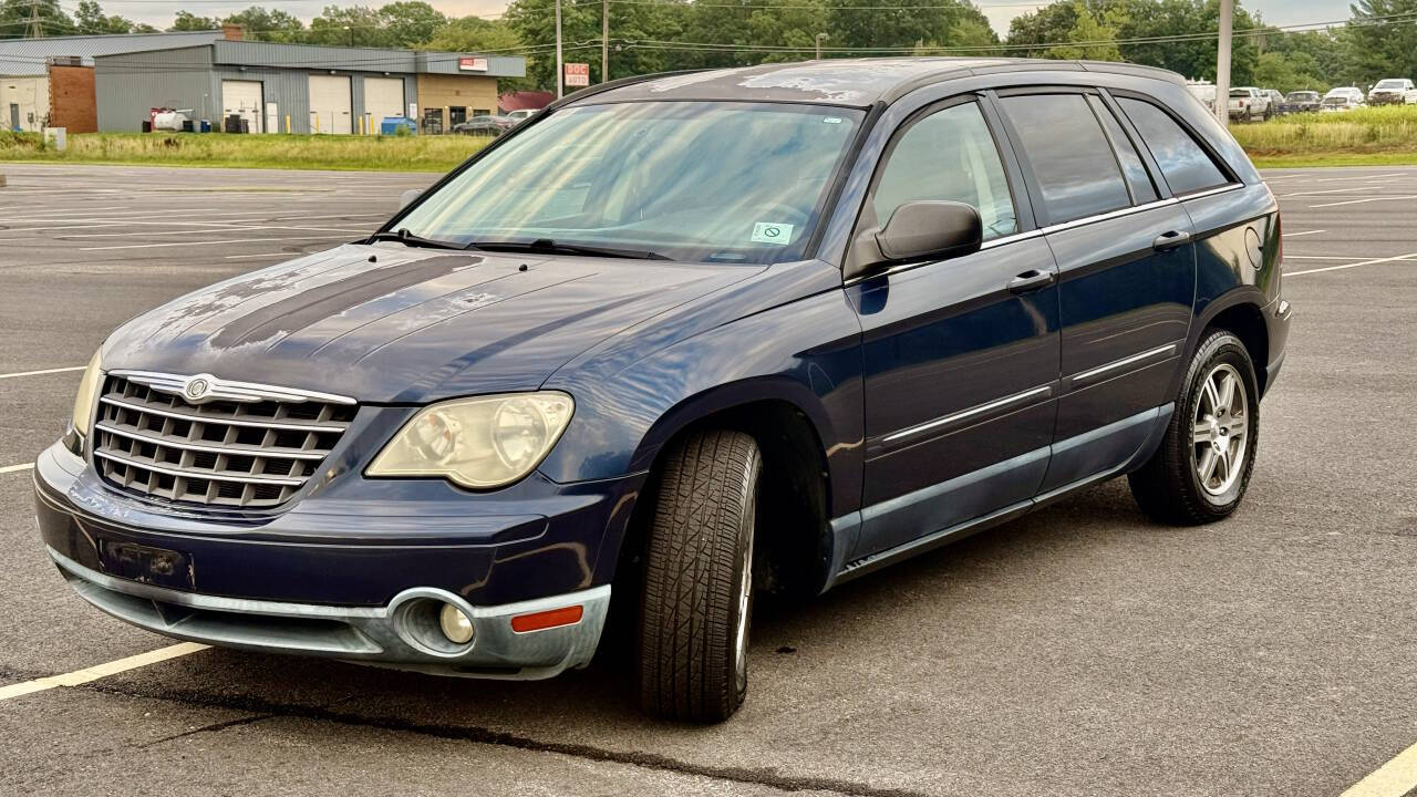 View vehicle photo 3