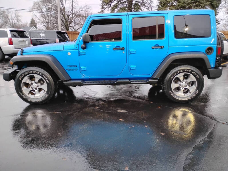 2016 Jeep Wrangler Unlimited for sale at Select Auto Group in Wyoming MI