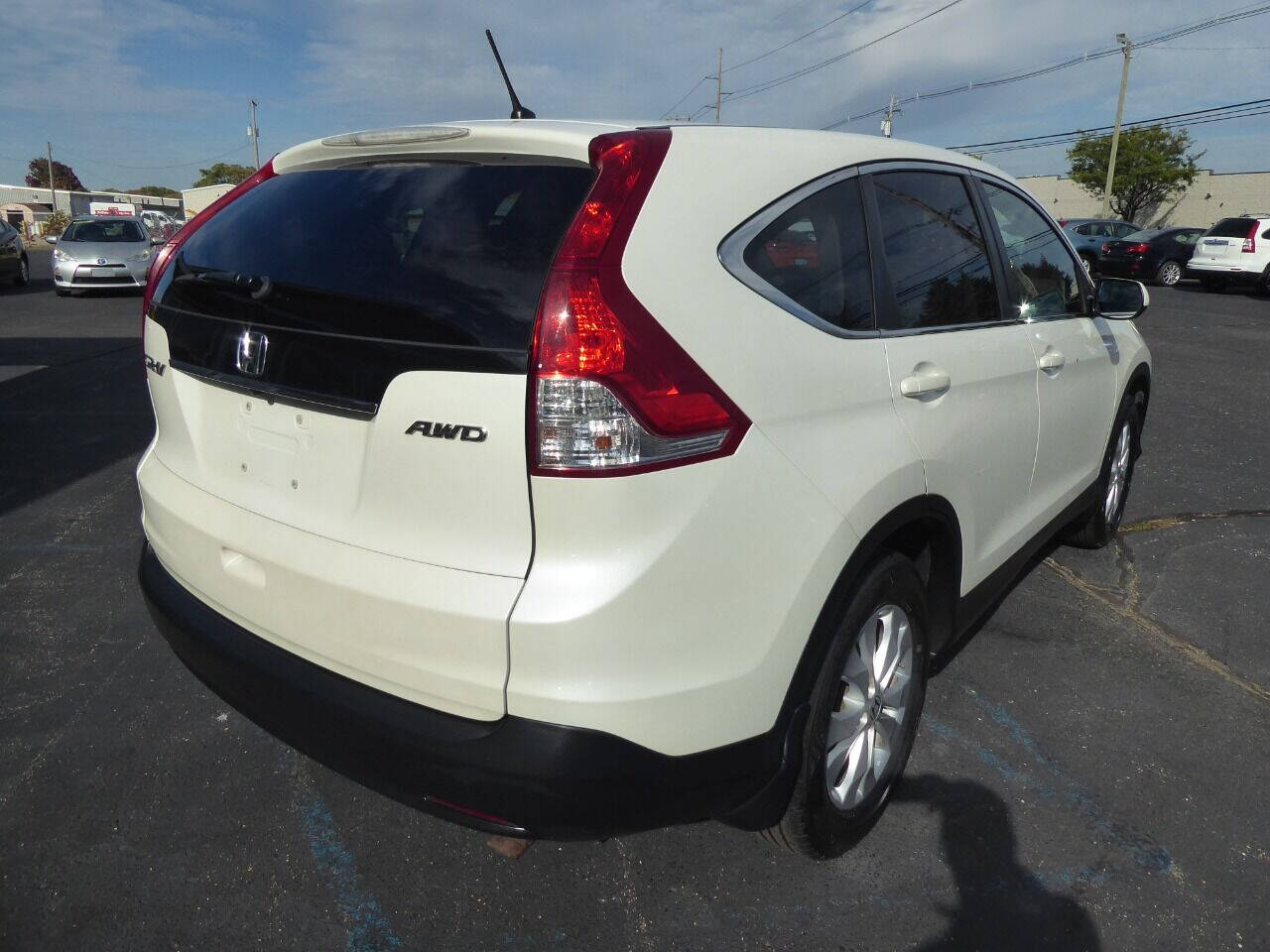 2012 Honda CR-V for sale at Lakeshore Autos in Holland, MI