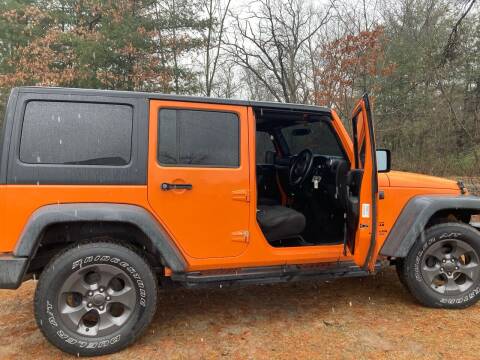 2012 Jeep Wrangler Unlimited for sale at Expressway Auto Auction in Howard City MI