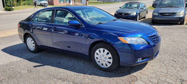 2007 Toyota Camry for sale at Cars For Less in Clarksville, TN