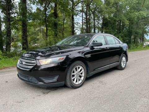 2014 Ford Taurus for sale at Next Autogas Auto Sales in Jacksonville FL