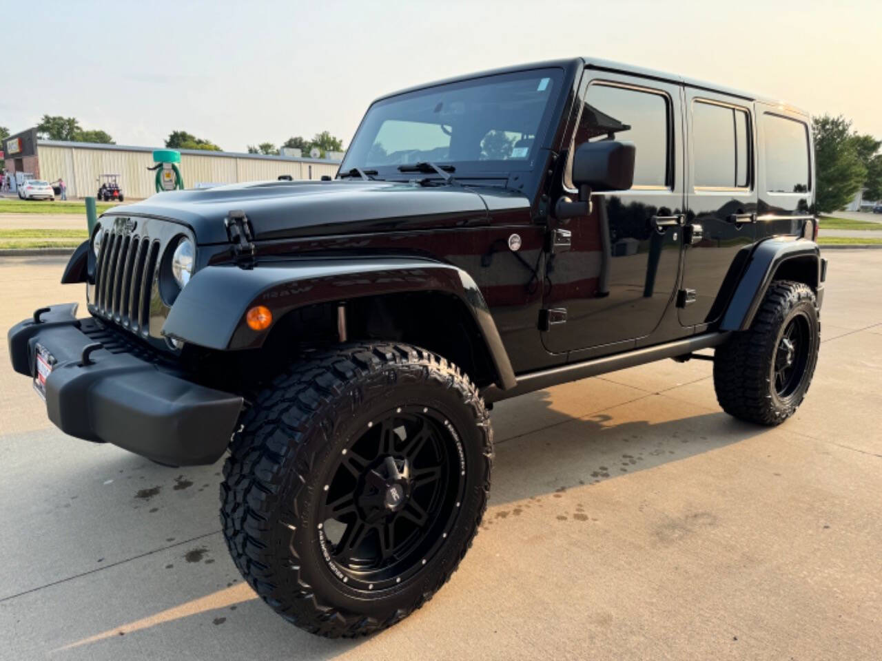 2015 Jeep Wrangler Unlimited for sale at Illinois Auto Wholesalers in Tolono, IL