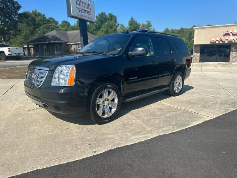 2011 GMC Yukon for sale at WHOLESALE AUTO GROUP in Mobile AL