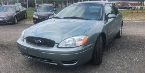 2006 Ford Taurus for sale at AUTO OUTLET in Taunton MA