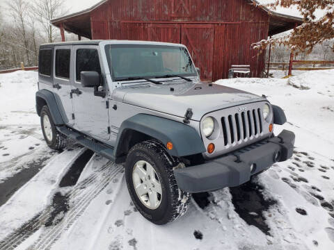 2013 Jeep Wrangler Unlimited for sale at Motor House in Alden NY