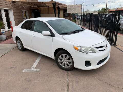 2013 Toyota Corolla for sale at CONTRACT AUTOMOTIVE in Las Vegas NV