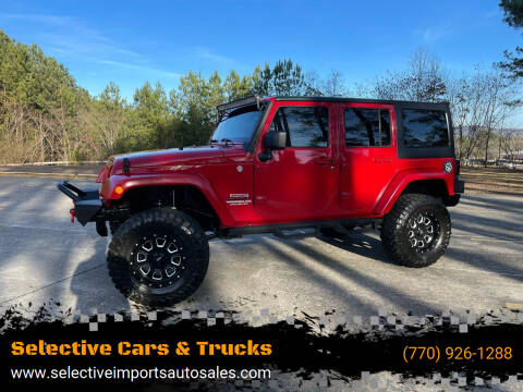 2011 Jeep Wrangler Unlimited for sale at Selective Cars & Trucks in Woodstock GA