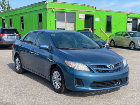 2013 Toyota Corolla for sale at Marvin Motors in Kissimmee FL