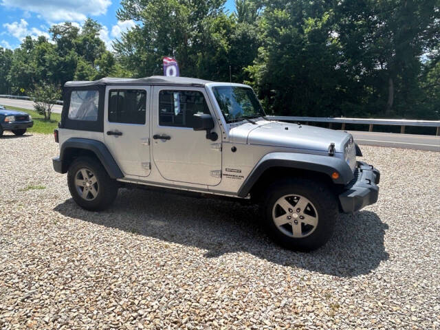 2012 Jeep Wrangler Unlimited for sale at STRODES AUTO GROUP LLP in Malta, OH