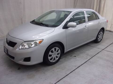 2009 Toyota Corolla for sale at Paquet Auto Sales in Madison OH