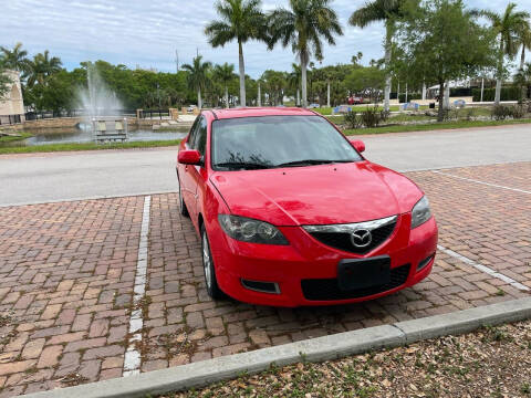 2007 mazda 3 sedan red