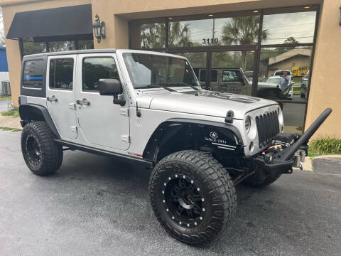 2011 Jeep Wrangler Unlimited for sale at Premier Motorcars Inc in Tallahassee FL