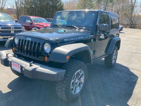 2013 Jeep Wrangler for sale at Louisburg Garage, Inc. in Cuba City WI