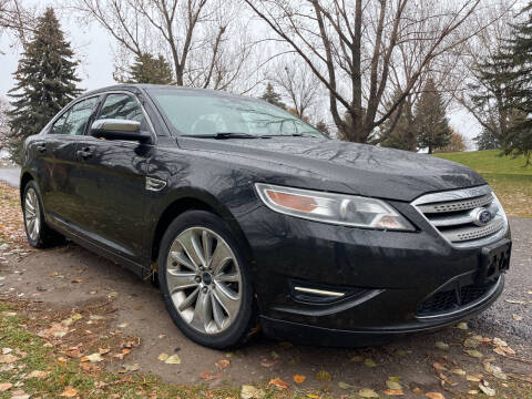 2011 Ford Taurus for sale at BELOW BOOK AUTO SALES in Idaho Falls ID