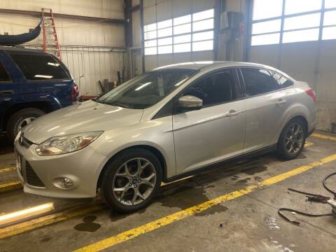 2014 Ford Focus for sale at BERG AUTO MALL & TRUCKING INC in Beresford SD