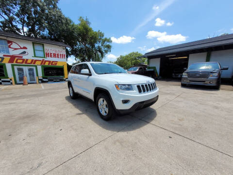 2014 Jeep Grand Cherokee for sale at AUTO TOURING in Orlando FL