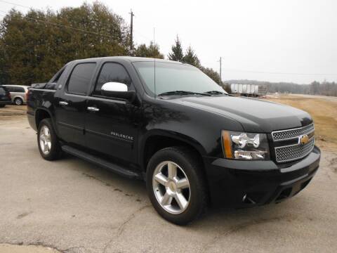 2013 Chevrolet Avalanche for sale at Arrow Motors Inc in Rochester MN