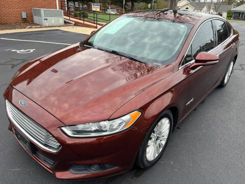 2016 Ford Fusion Hybrid for sale at Explorer Auto Sales in Selma NC