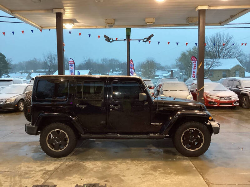 2012 Jeep Wrangler Unlimited for sale at DRIVE SAFE AUTO LLC in Springfield OH