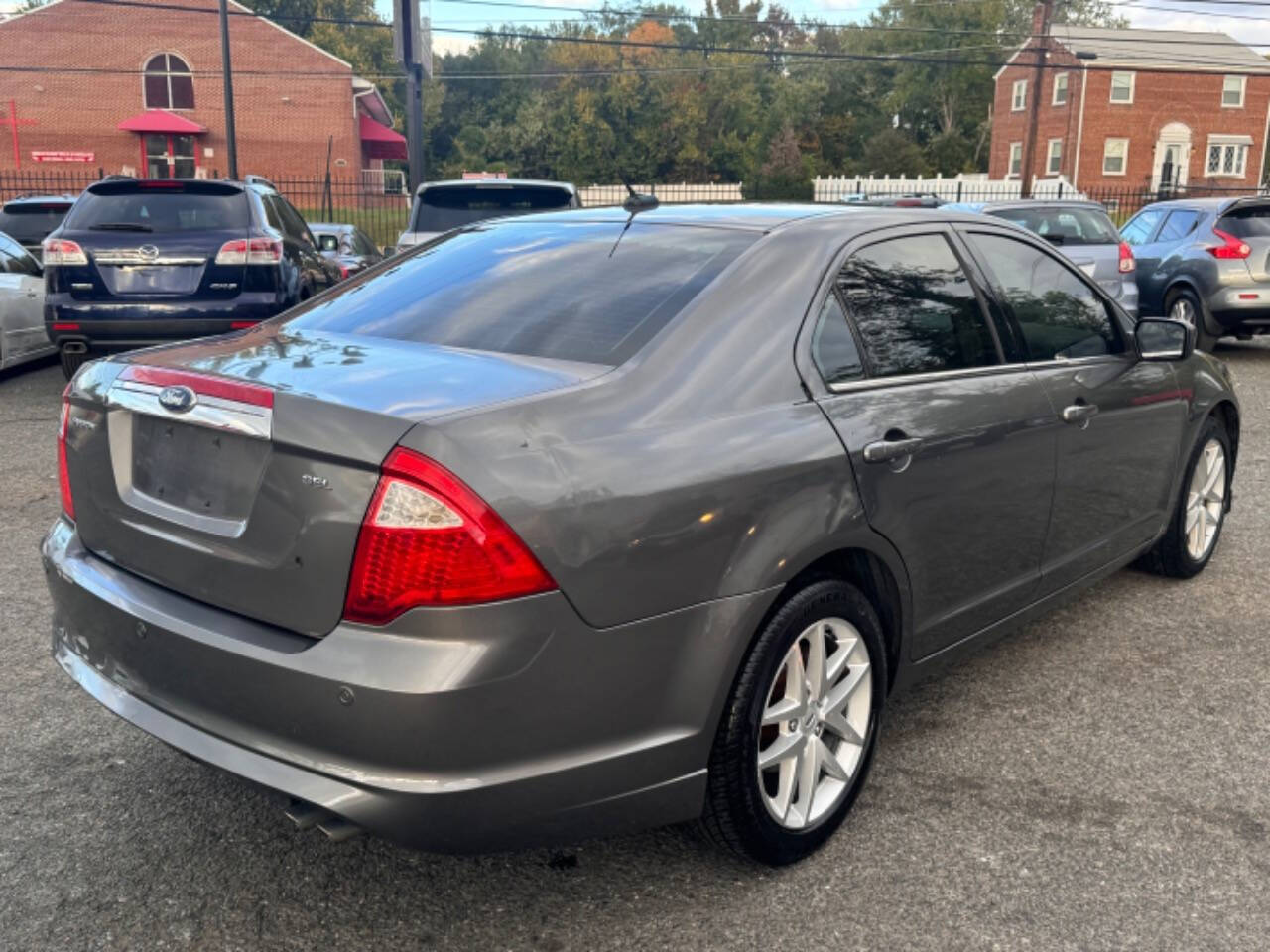 2012 Ford Fusion for sale at Walkem Autos in District Heights, MD