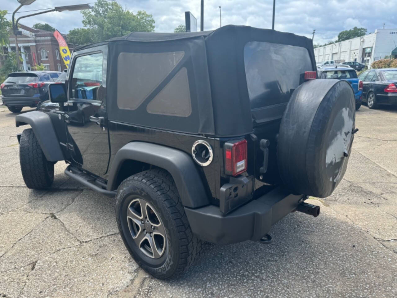 2011 Jeep Wrangler for sale at First Class Auto Mall in Akron, OH