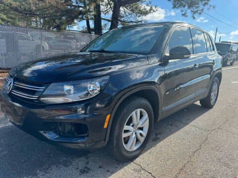 2013 Volkswagen Tiguan for sale at Mandingo's Automotive & Sales LLC in Snellville GA