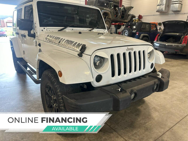 2017 Jeep Wrangler Unlimited for sale at Postal Pete in Galena IL
