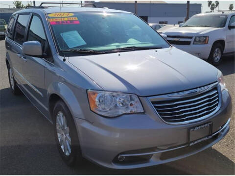 2014 Dodge Grand Caravan for sale at MERCED AUTO WORLD in Merced CA
