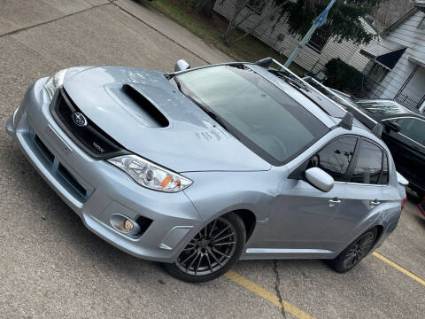 2014 Subaru Impreza for sale at Exclusive Auto Group in Cleveland OH