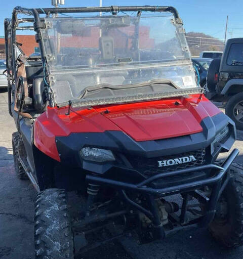 Honda Pioneer 700-4 Deluxe Image