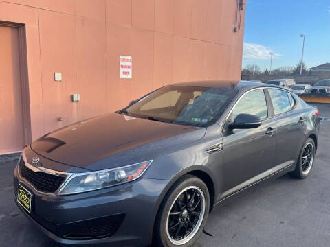 2011 Kia Optima for sale at ENZO AUTO in Parma OH
