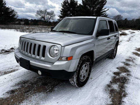 2011 Jeep Patriot for sale at Hammer Auto LLC in Stanwood MI