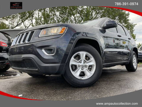 2014 Jeep Grand Cherokee for sale at Amp Auto Collection in Fort Lauderdale FL