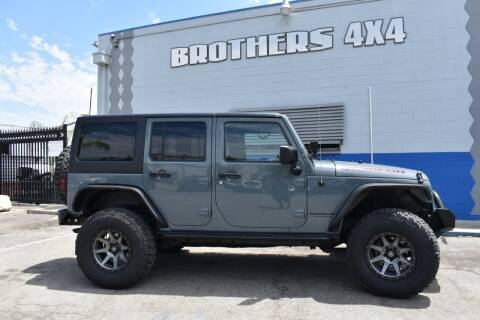 2014 Jeep Wrangler Unlimited for sale at Brothers Wholesale Auto in Montclair CA